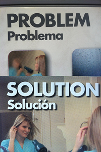 A photograph of two Spanish English brochures. One is Problem: Problema and the other is Solution: Solución.