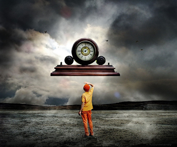 A person stands in a barren field, wearing vivid orange against a gray, cloudy backdrop. Overhead, surrounded with light, a clock flies out of the sky toward the person.