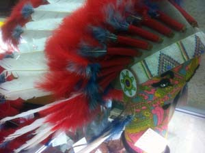 A photograph of an American Indian’s headdress