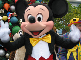 A photograph of a person in a Mickey Mouse costume