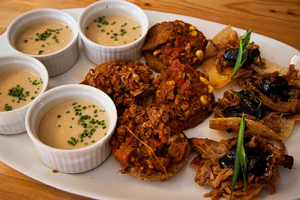 A photograph of a plate of various appetizers