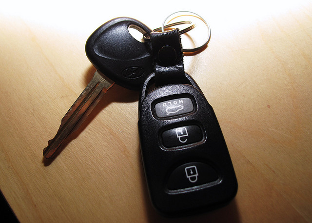 A photograph of a set of car keys on a table