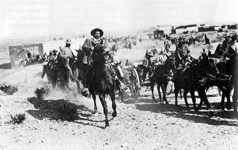 A photograph of Mexican revolutionary leader Pancho Villa riding a horse.