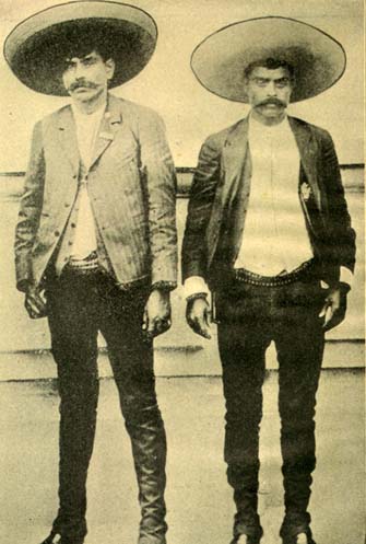 A photograph of Mexican revolutionaries Euphemio and Emiliano Zapata. They are both wearing large Mexican style sombreros.