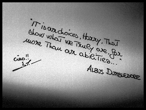 An image of a handwritten note that reads: “It is our choices, Harry, that show what we truly are, far more than our abilities. . . Albus Dumbledore”