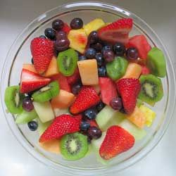 A bowl of sliced, ready-to-serve fruit