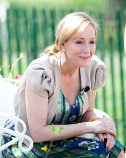 Photo of author J.K. Rowling as she leans forward at a reading from “Harry Potter”
