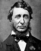 A photograph of American writer Henry David Thoreau. He is dressed in formal men's attire of the late 19th century.