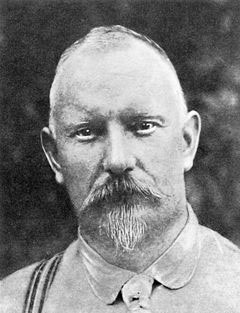 Sitting photo portrait of Robert Leroy Parker (a.k.a. Butch Cassidy).