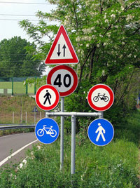 Image signage on road indicating pedestrian and bicycle traffic