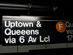 Sign with typo: ‘Uptown and Queens,’ with three ‘e’s in Queens. © 2008 by Squid Ink