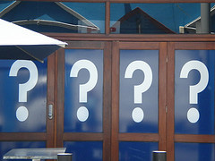 Question marks on doors