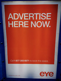 A billboard asking viewers to “Advertise here now.”