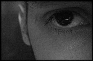  A up close photograph of a person's eye