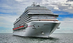A photograph of a Carnival Cruise ship off the coast of Belize.