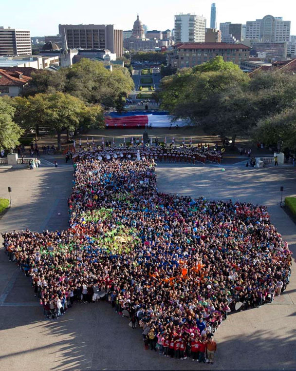 Image of the shape of Texas filled in will hundreds of people