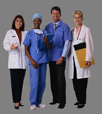 Image of four healthcare professionals standing in a row