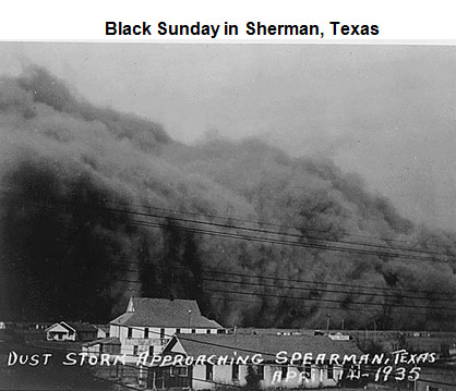 Image of a large black cloud of dust looming over several buildings in Sherman, Texas