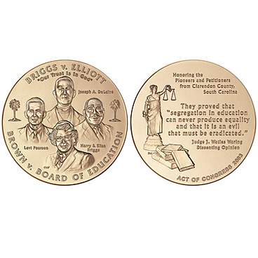 A photograph of both sides of a gold coin minted to commemorate the Brown V Board of Education case