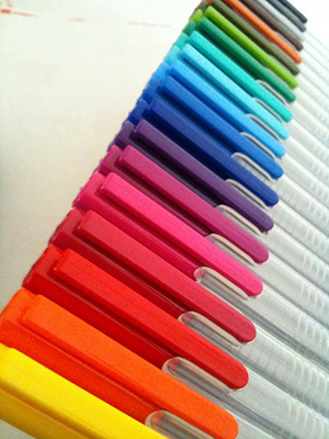 A photograph of a set of colored pens showing their range of colors