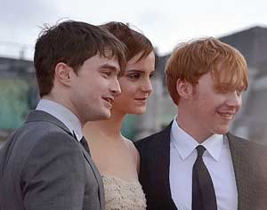 photo of the three actors who play Harry, Hermione, and Ron in the Harry Potter movies