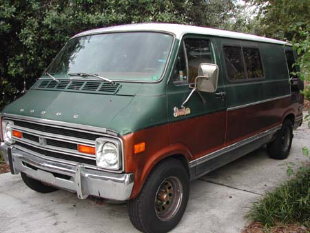 A photograph of a 1070s Dodge Van.