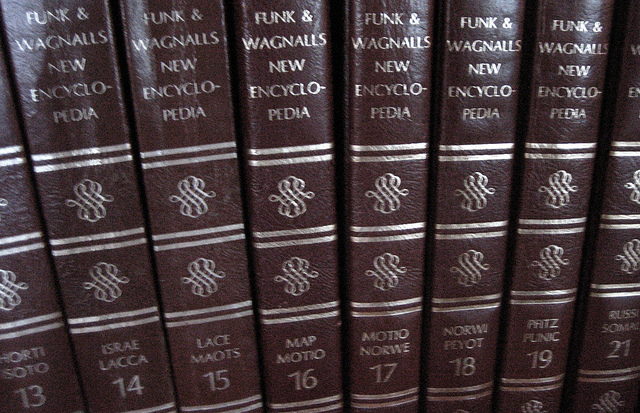 A photograph of Funk and Wagnall’s encyclopedia binders