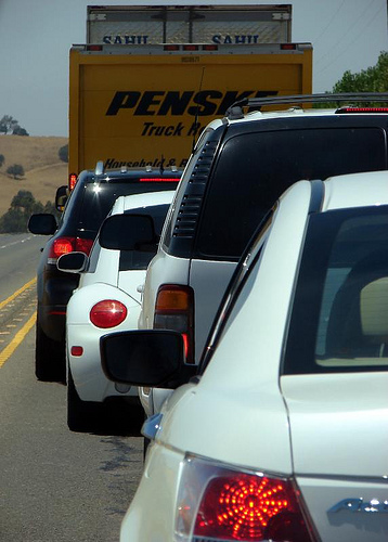 A photograph of traffic taken from a street level