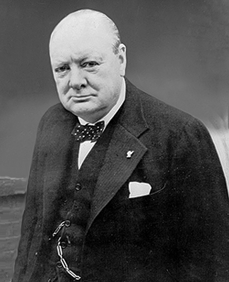 A photograph of British prime minister Sir Winston Churchill. He is an older man wearing a three-piece suit.