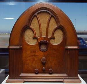 A photograph of an antique wooden radio