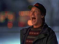 A photograph of the actor Chevy Chase screaming maniacally