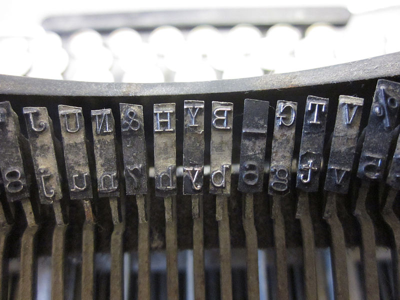 photo of the backside of several typewriter keys