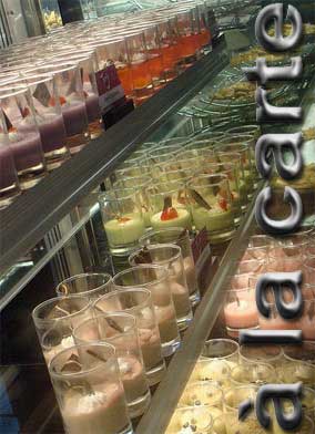 An image of a salad bar with price tags and labels on each item.