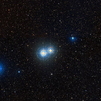 A photograph of several stars taken through a telescope.