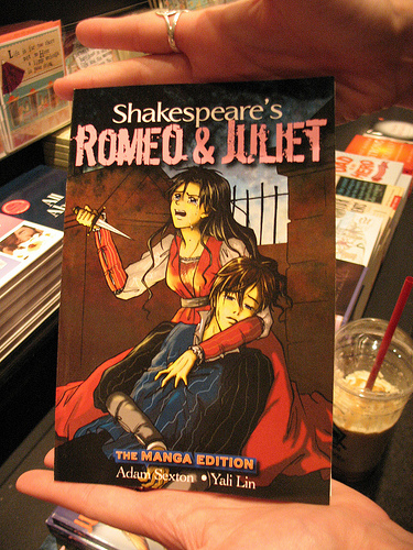 photo of a comic book cover that shows Juliet holding a dead Romeo and tearfully raising a knife to kill herself