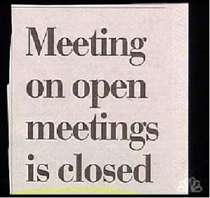  A newspaper heading that reads “Meeting on open meetings is closed.”