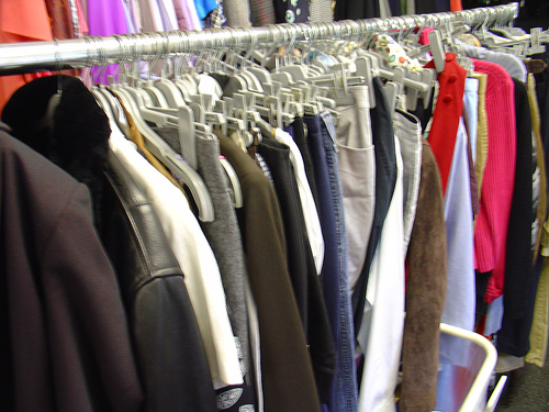 A photograph of a rack of clothes like the ones locate in stores