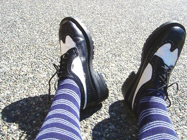 A point of view photograph of the photographer’s shoes.