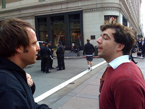 A photograph of two men talking that obviously don't like each other