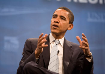Barack Obama gesturing as he speaks.