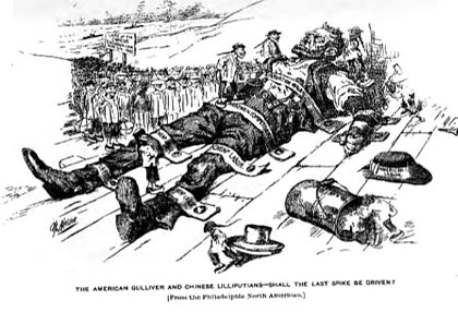 An Man is likened to Gulliver and is strapped to the ground. Small Chinese men stand on his torso in this cartoon from the 1880s. The caption reads, ‘The American Gulliver and Chinese Lilliputians—shall the last spike be driven?’