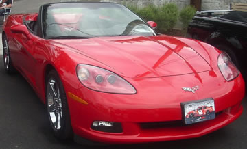 Image of shiny red convertible Corvette
