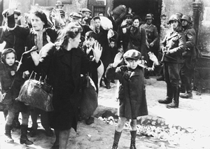 A photograph of German soldiers taking Jewish women and children as prisoners.