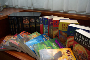 A photograph of the entire series of Harry Potter books on a table.