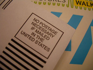 A photograph of an envelope that reads “No Postage Necessary if mailed in the United States.”