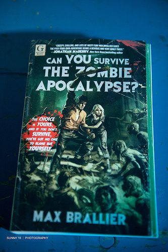 A photograph of the cover of a book titled “Can You Survive the Zombie Apocalypse?”