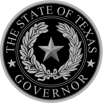 An image of the Seal of the Governor of Texas. It is a star with wreaths around it surrounded by the words “The State of Teas Governor.”