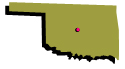 A green cut-out of the state of Oklahoma